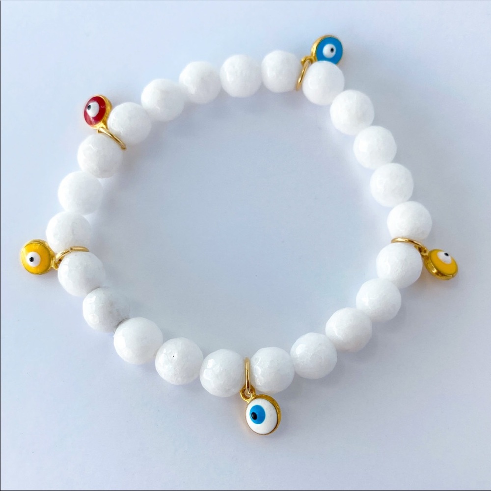 White evil eyes bracelet. One size